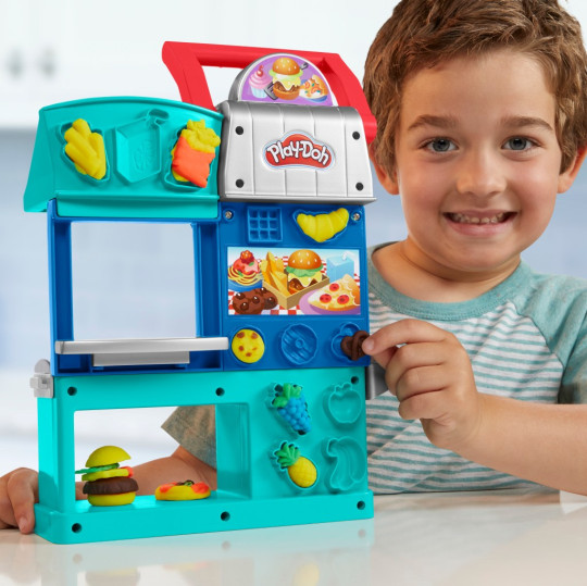 A Play-Doh Kitchen Creations Busy Chef’s Restaurant Playset is one of the fun sets in the bundle