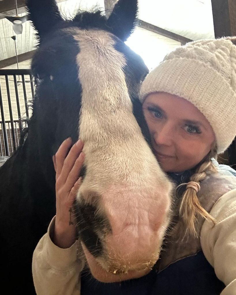 Miranda Lambert poses with her horse Leiani