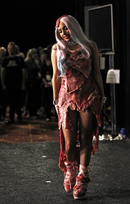 Lady Gaga walks backstage wearing a dress made of meat after accepting the award for video of the year for “Bad Romance” at the MTV Video Music Awards in Los Angeles, September 2010