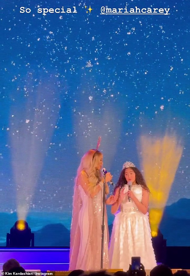 Duet: Mariah Carey, 54, brought her daughter Monroe 12, on stage with her for a duet of her 1994 hit Jesus Born on This Day