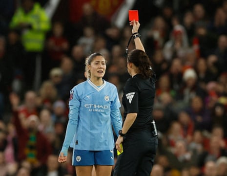 Manchester City's Laia Aleixandri is shown a red card by referee Cheryl Foster.