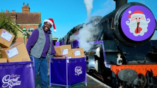 a Cadbury's worker delivering packages for cadbury secret santa
